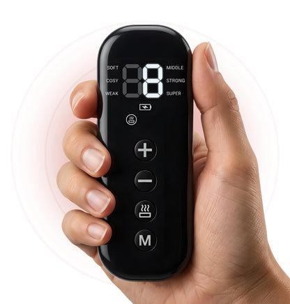 Hand holding PawMoves Restore pet massage wrap remote control with function buttons and LCD display